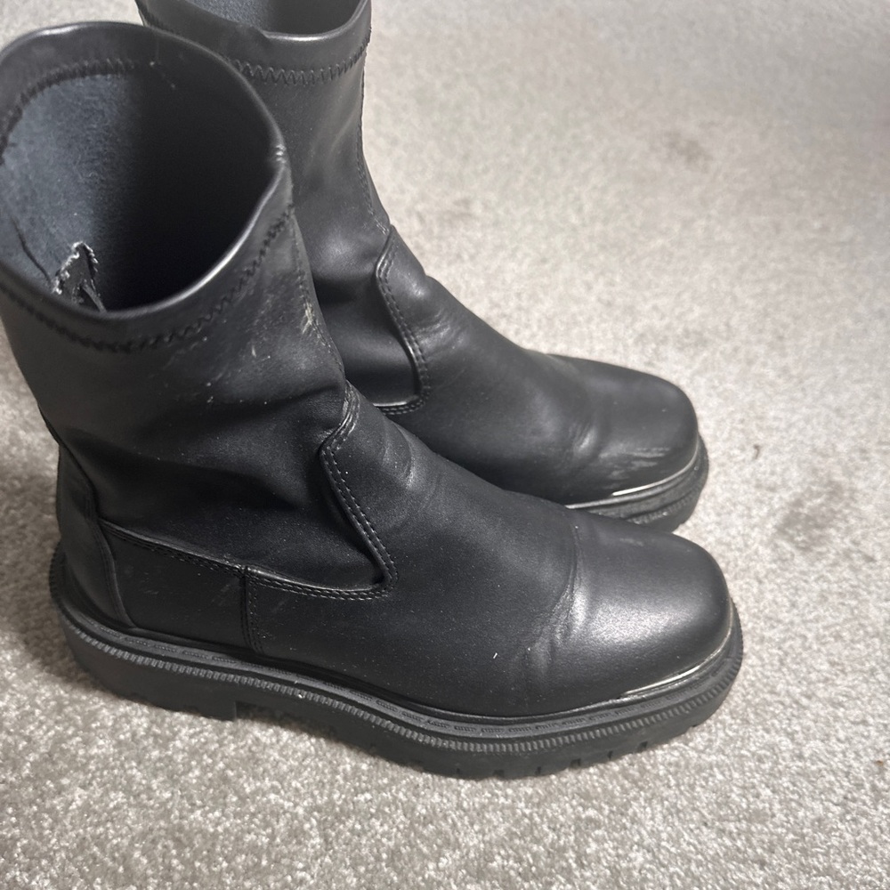 Black ankle boots with silver details